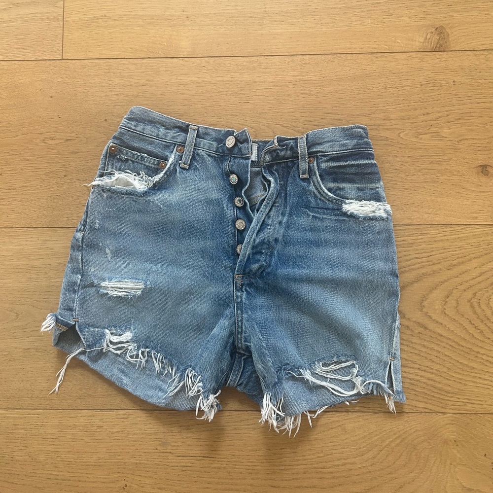 Agolde High-Waist Distressed Denim Shorts in Light Blue